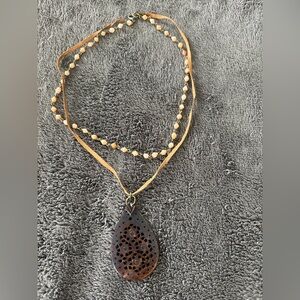 2/$20 90s necklace with carved pendant